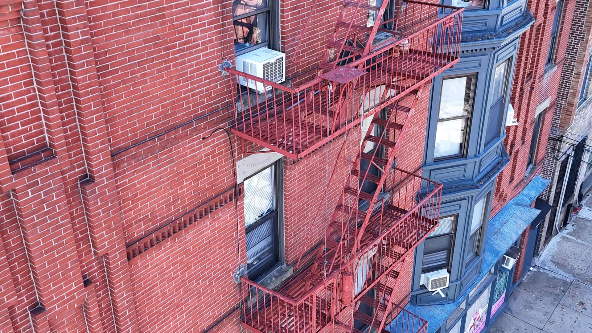 Aerial inspection-day view of a New Jersey fire escape during a certification pass